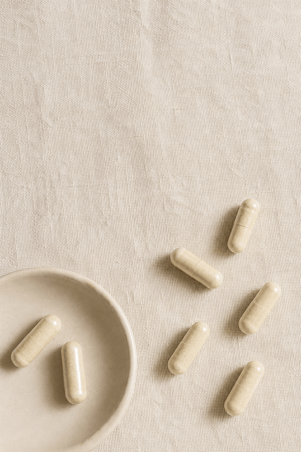Magnesium capsules arranged beside a ceramic dish