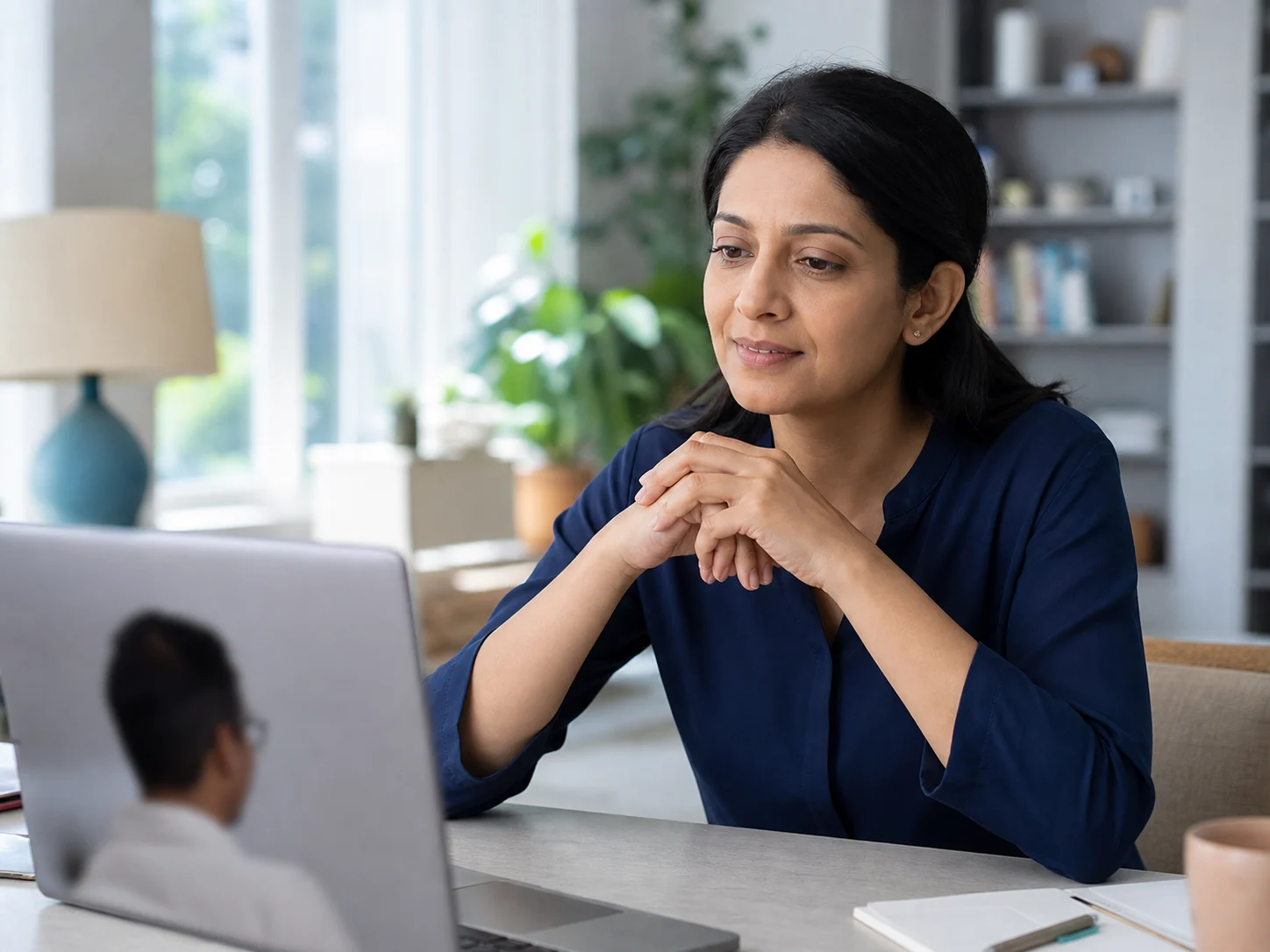 Woman speaking during an online consultation